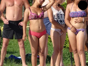 Hot chick with a nice ass at the pool in a white see through thong