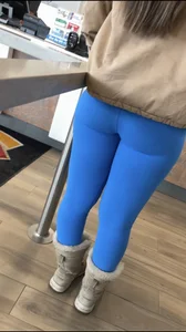 Hot babe ordering food in bright blue leggings