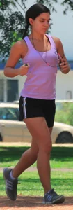 Hot brunette running in short shorts with vpl