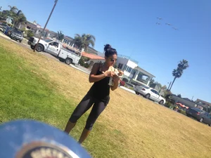 Hot brunette babe in leggings walking her dog with a nice ass and some cleavage