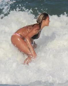 Hot surfer chicks out in the water