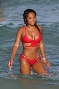 Christina Milian in red bikini in Miami with hard nipples
