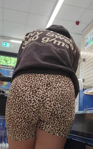 Thick brunette in short leggings and company