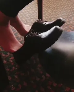 Teen Girl Moving Her Feet in Pantyhose and Shoes Half Taken Off Under Table Candid Video