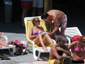 Beach voyeur girls in bikinis, thongs and topless