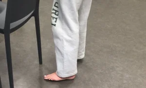 Bare Feet Closeups at a Desk Creepshots Gallery