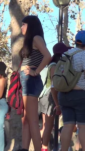 Cute Latina teen in short denim shorts