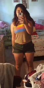 Chubby Bespectacled Girl Taking Selfies in Her Underwear