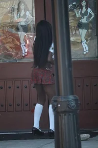 Sexy ebony Tilted Kilt employee in her uniform
