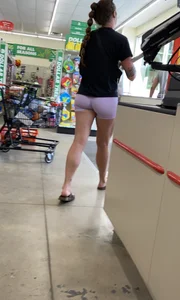 in purple Lycra shorts…