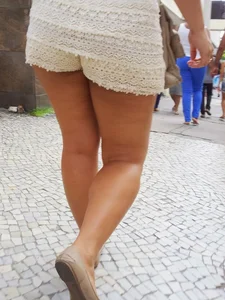 Big ass in shorts and ebony friend in leggings