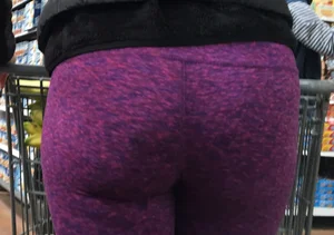 Milf shopping with a nice ass in purple leggings
