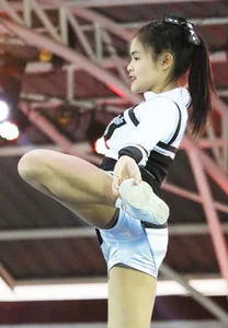 Bunch of athletic Thai cheerleaders at a competition
