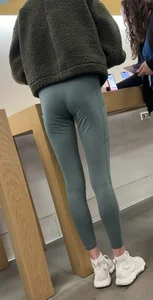 Skinny Blonde in Tight Green Leggings