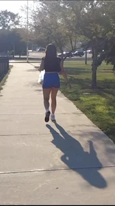 Sexy Candid Girl in a Top And Blue Shorts Walking Down the Street Creepshots Gallery