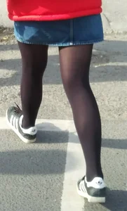 Girl out in denim skirt and tight stockings with nice legs