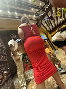 Woman in a red dress shopping, HUGE ass