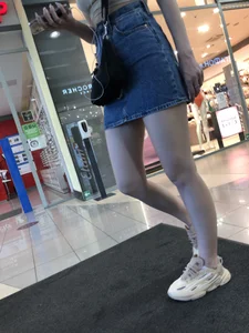 Sexy Candid Girl in a Denim Skirt And Sneakers With Hot Pale Legs Mall Creepshots Gallery