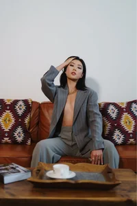 Asian topless girl in a formal suit