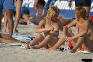 Beach voyeur girls in bikinis, thongs and topless