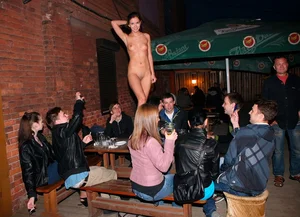 Only one is nude - group photos where only 1 girl is naked, and the rest of the people are dressed
