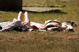 Creepshots of some girls in the park getting some sun in bikinis