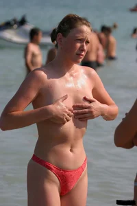 Sexy candid topless and nude beach girls