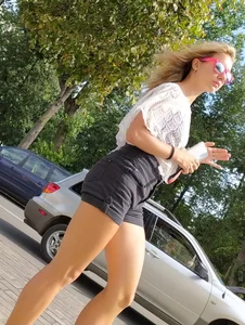 Girl with Muscular Fit Legs in Shorts Street Creepshot