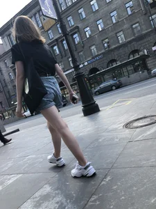 Candid Teen in Denim Shorts And Sneakers With Slim Legs Street Photos