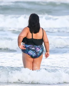 Extra thick girl at the beach in a bikini