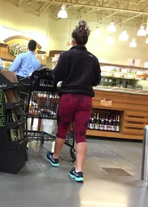 Milf grocery shopping in red leggings with a great ass