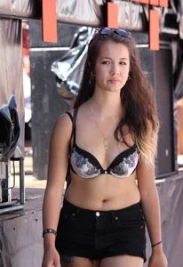 Boobs out in public in either bikini tops or bras