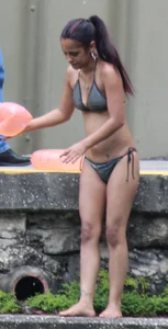 Sexy brunette milf in a bikini with a great body, nice ass and some camel toe