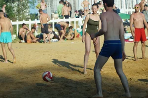 Milf with Amazing Fit Ass in Green One-Piece Swimsuit Playing Volleyball on the Beach Creepshots Gallery