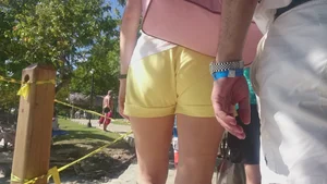 Milf in yellow shorts with vpl and a wedgie