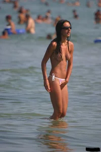 Sexy candid topless and nude beach girls