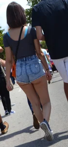 Thick booty babe in denim shorts showing her cheeks