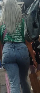 Blonde girl wearing blue jeans with a great ass street creepshots
