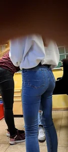 Girl is showing her blue jeans