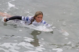 Candid surfer babes on the beach and in bikinis