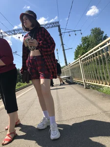 Cute candid teen on a train platform