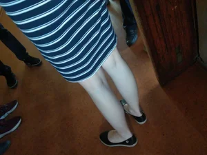 Legs in Flats Candid Photo