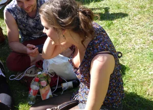 2 sexy girls showing nice cleavage while sitting together