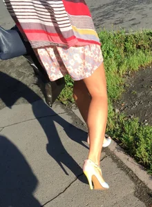 Milf in a Dress and Pantyhose on High Heels Street Closeup