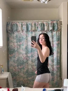 Cute Skinny Girl in Tight Mini Shorts Bathroom Mirror Selfie