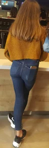 Perfect ass in tight blue jeans with a phone in back pocket at the store creepshots