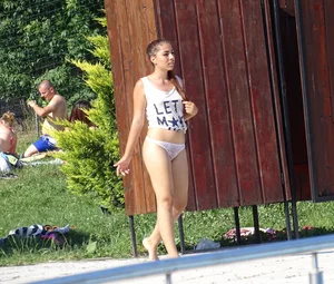 Sexy big bootied Latino girl in see thru underwear thong and white top with no bra