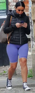 Wide hipped, juicy fronted tanned brunette pawg struts in lycra shorts