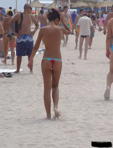 Beach voyeur girls in bikinis, thongs and topless
