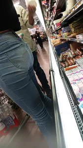 Skinny milf with pink hair in tight jeans shopping